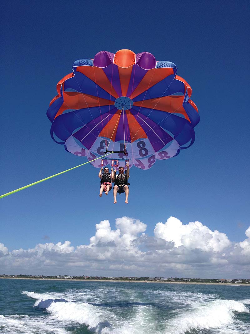 Hang out and enjoy the view on a parasailing trip with Tidal Wave Water Sports.